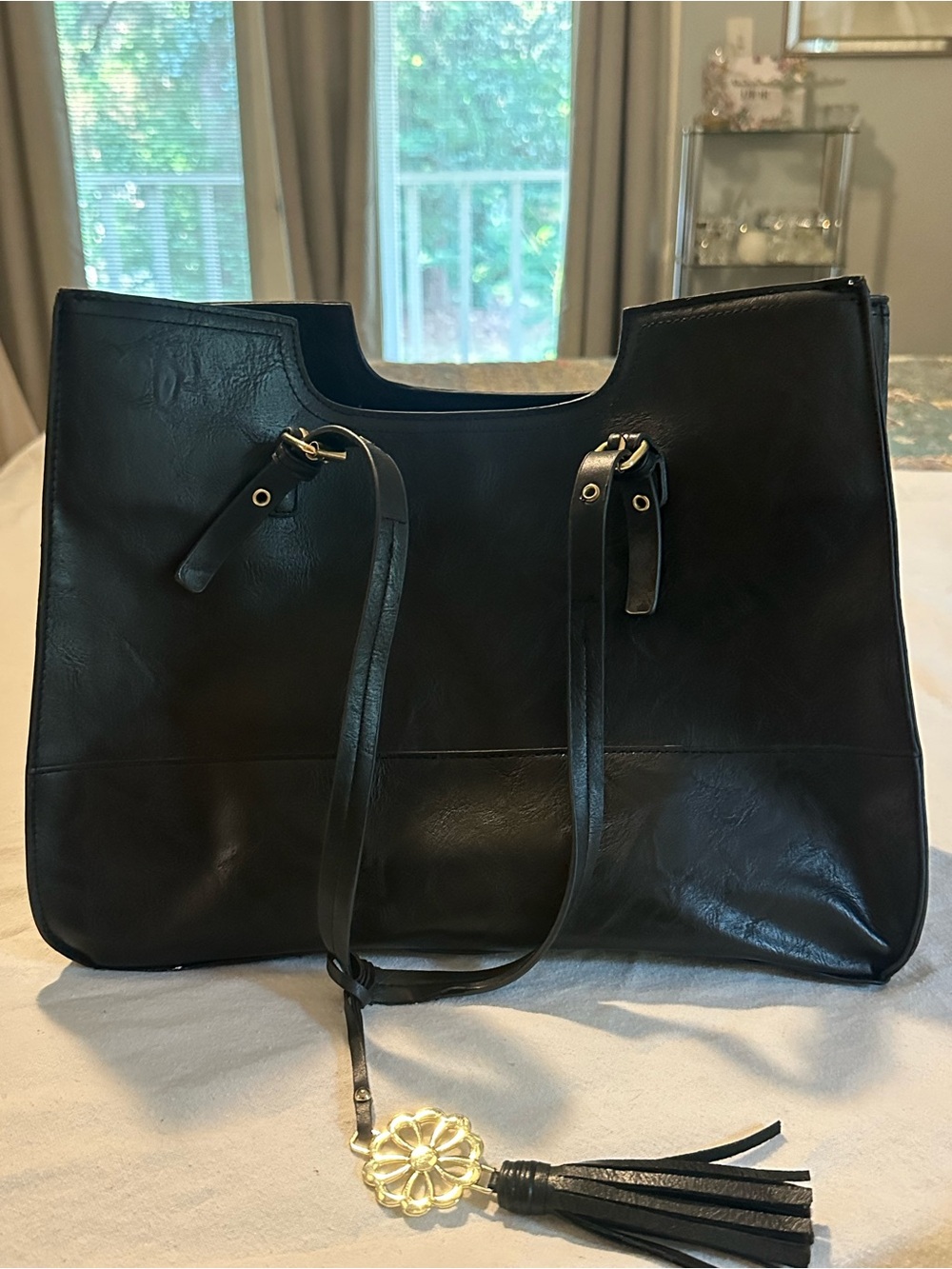 BUENO Black Leather Tote Bag with Tassel Charm